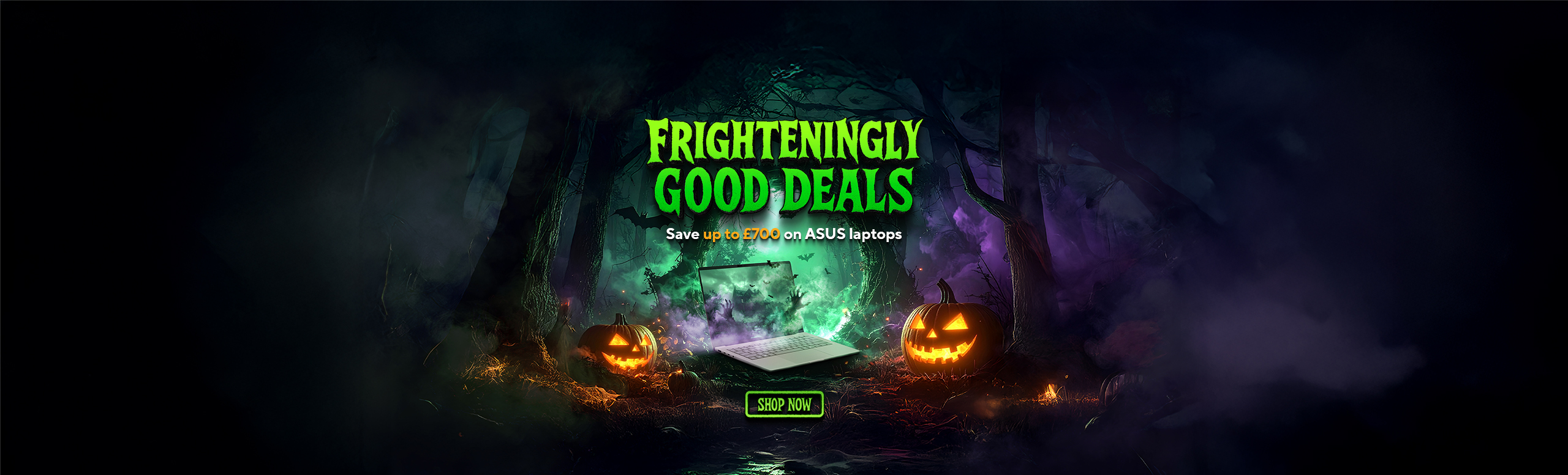 An ASUS laptop amidst a spooky Halloween scene